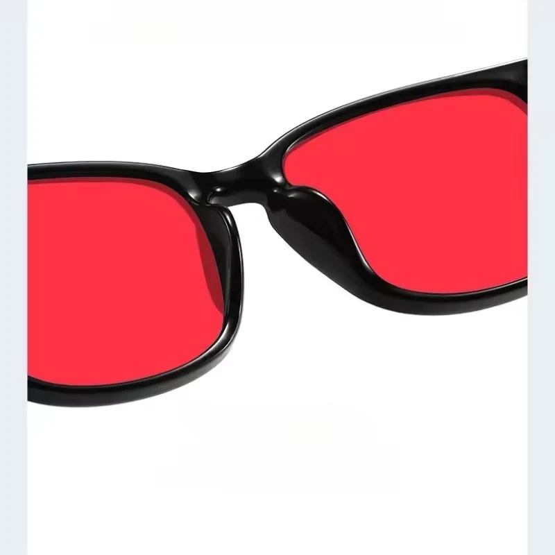 Red lenses, bridge and black square frame in a supplier close-up